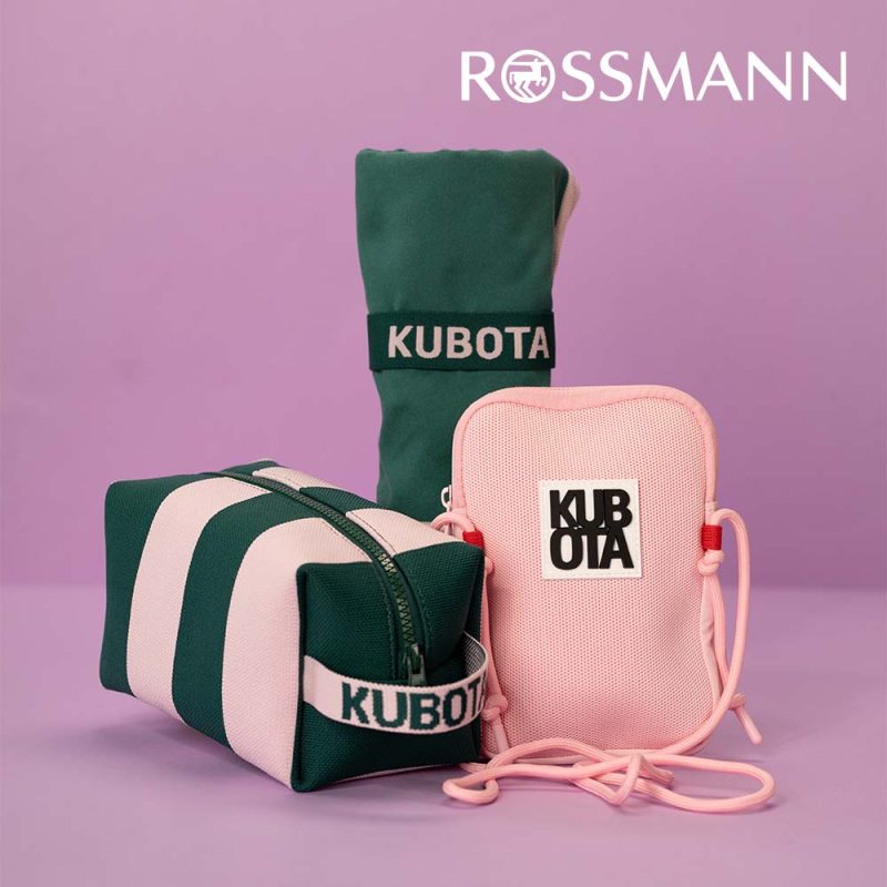 Grafika promocyjna salonu Rossmann, promująca najnowszą kolekcję KUBOTA dostępną w drogerii.