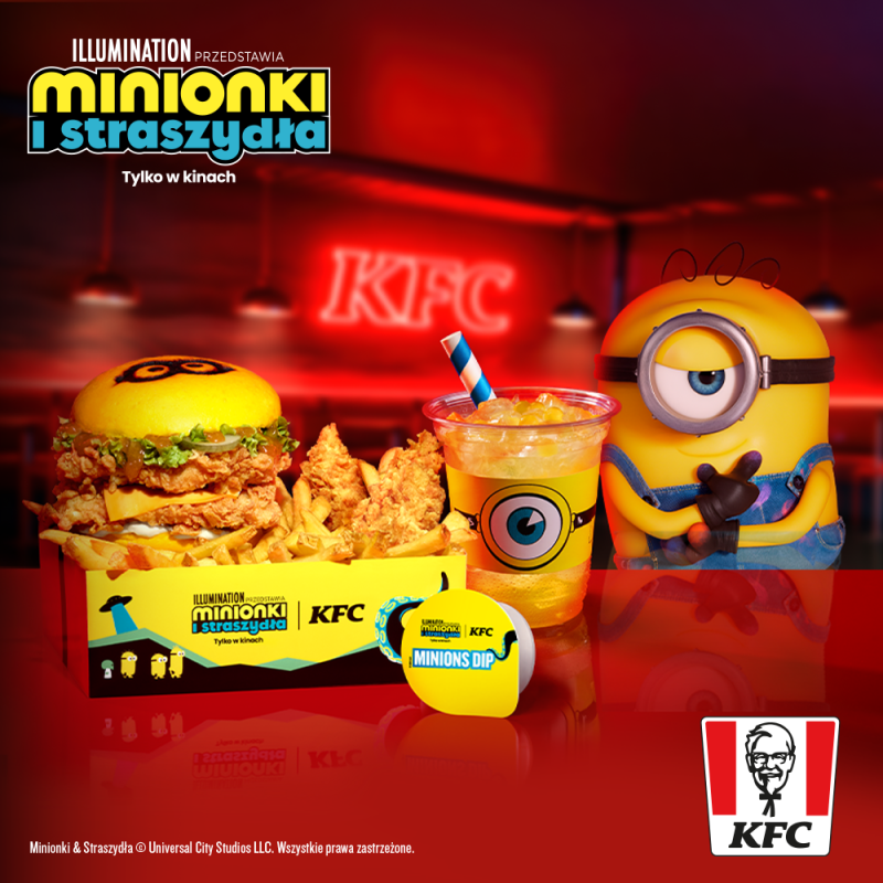 Kolorowa grafika marketingowa KFC prezentująca zestaw inspirowany Minionkami. Na czerwonym tle znajdują się burger, frytki, kawałki kurczaka, napój z grafiką Minionka oraz sos, a obok widoczny jest uśmiechnięty Minionek w niebieskich ogrodniczkach. Na grafice umieszczono logo filmu „Minionki i Straszydła” oraz logo KFC.