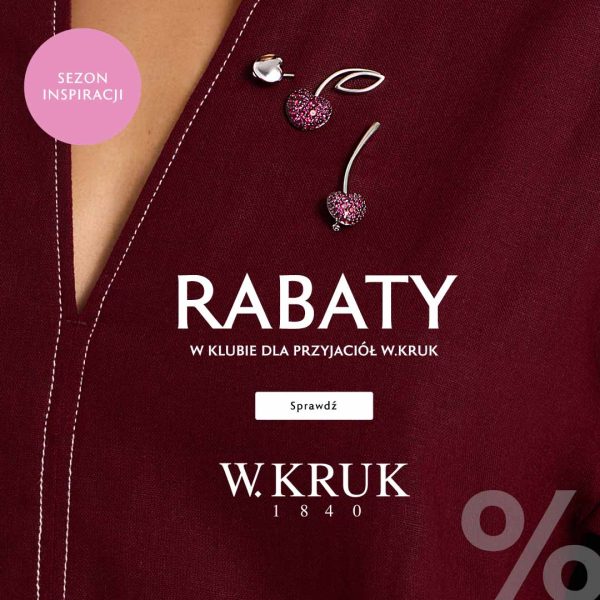 Elegancka przypinka w kształcie wisienek wysadzana różowymi kamieniami na ciemnowiśniowym tle w grafice promocyjnej W.KRUK w Galerii Echo w Kielcach